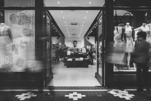 black and white image of clothing store's entrance